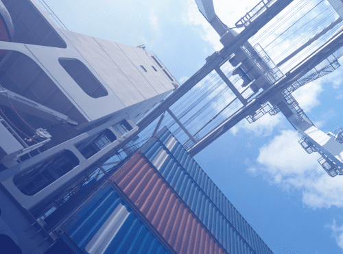 Container handling operation at an industrial port facility
